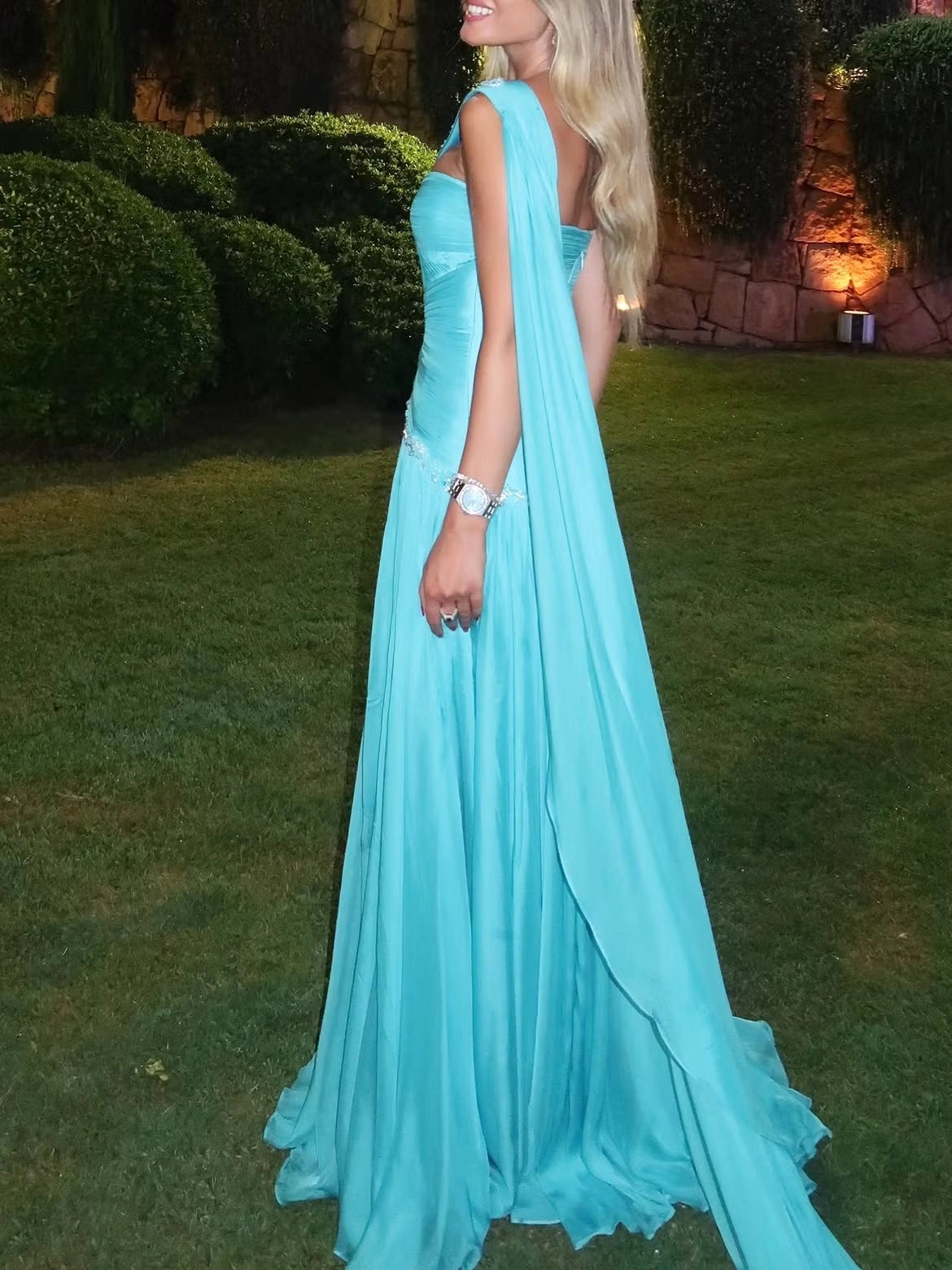Aqua floor-length prom dress with straight back and long draped shoulder scarf